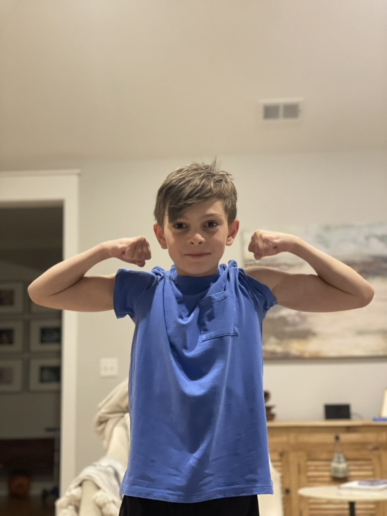 Sawyer flexing his arms